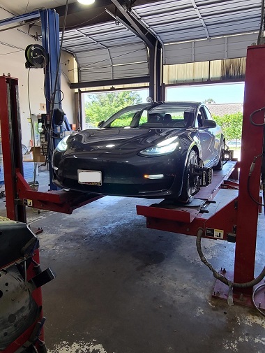 Tesla car tire installation and alignment